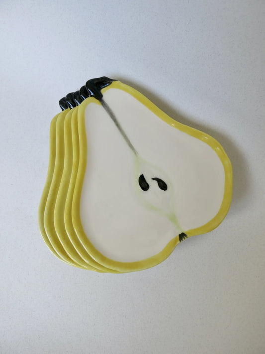 Set piatti M.A.C. a forma di pera – piatti impilati visti dall'alto